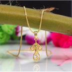Women's Gold Color Om Temple Locket