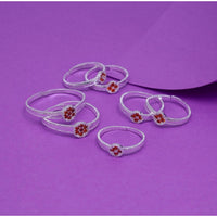 Women's Multi Color Assorted Design Toe Rings Combo Of 4 Pairs