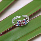 Women's Multi Color Assorted Design Adjustable Toe Rings Combo Of 4 Pairs